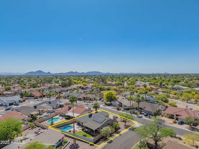 bird's eye view featuring a mountain view and a residential view