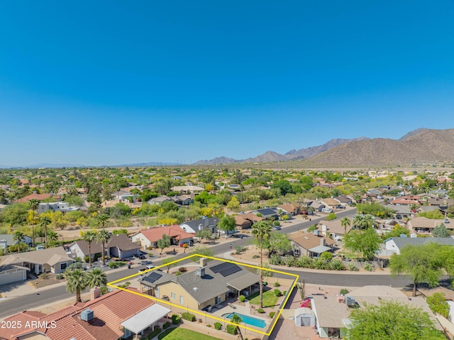 birds eye view of property featuring a mountain view and a residential view