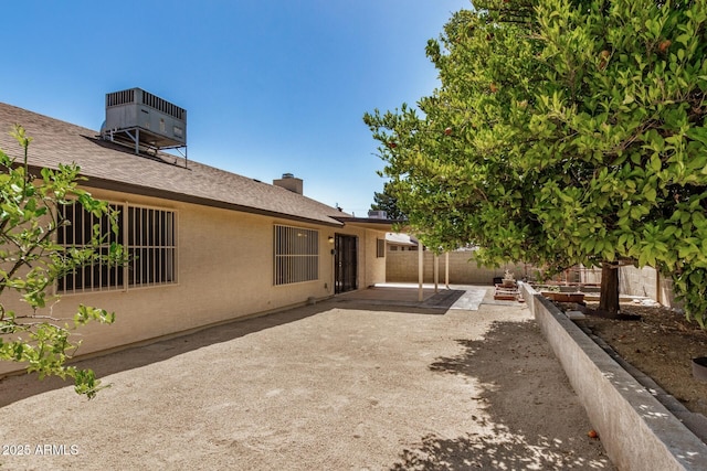 6602 W Ironwood Dr, Glendale, AZ 85302 - view of yard featuring central AC and a patio