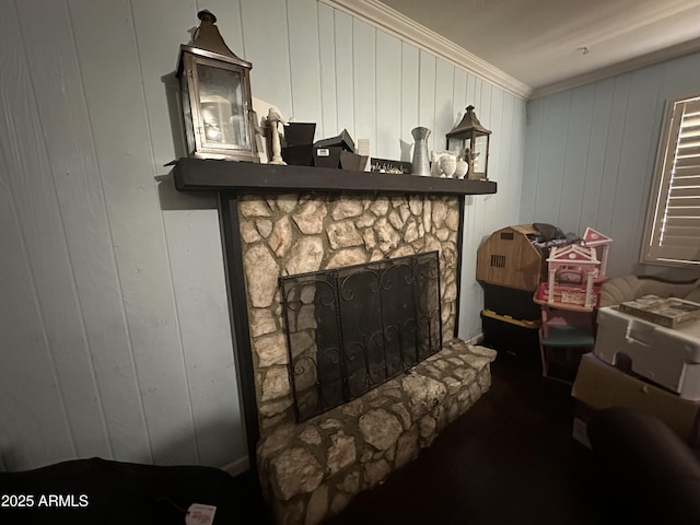 interior space featuring crown molding and a fireplace