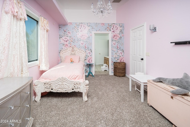 carpeted bedroom with an inviting chandelier