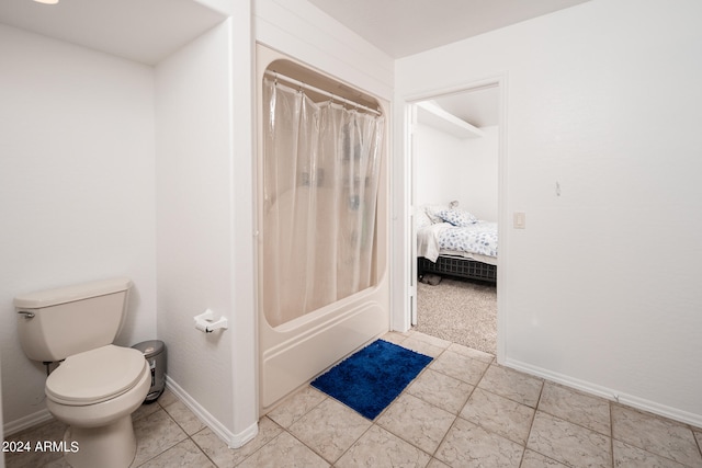 bathroom with shower / tub combo with curtain, toilet, and tile patterned floors