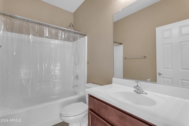 full bathroom with vanity, toilet, and shower / bath combo with shower curtain