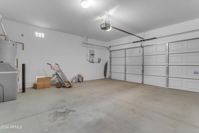 garage with a garage door opener and water heater