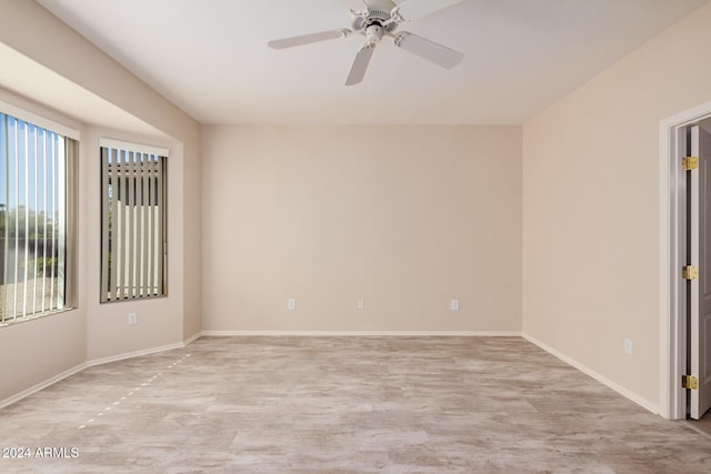 unfurnished room featuring ceiling fan