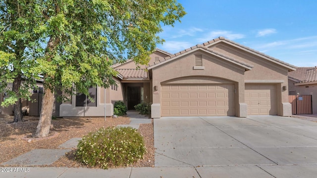 view of front of property featuring a garage