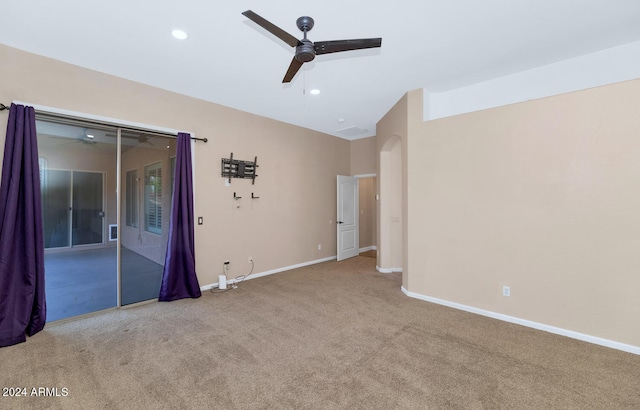 interior space featuring ceiling fan