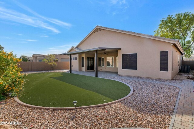 back of property with a patio, central AC, and ceiling fan