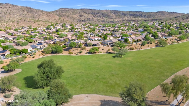 birds eye view of property featuring a mountain view