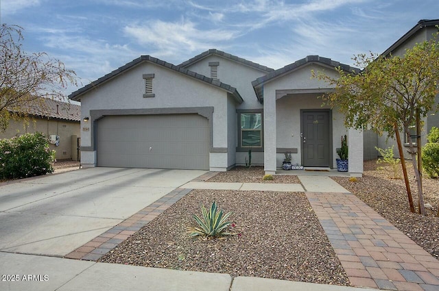 19563 W Annika Dr, Litchfield Park, AZ 85340 - view of front of house featuring a garage