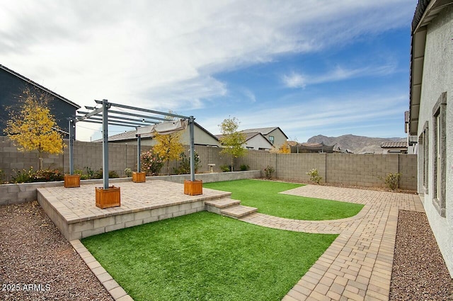 view of yard featuring a pergola and a patio area