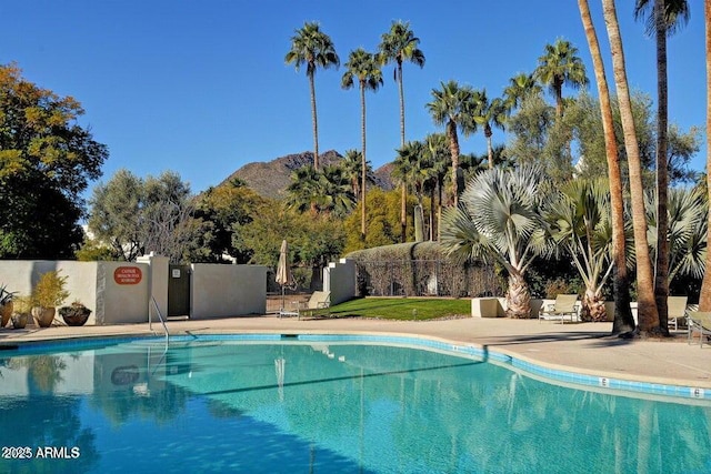 view of pool with a mountain view