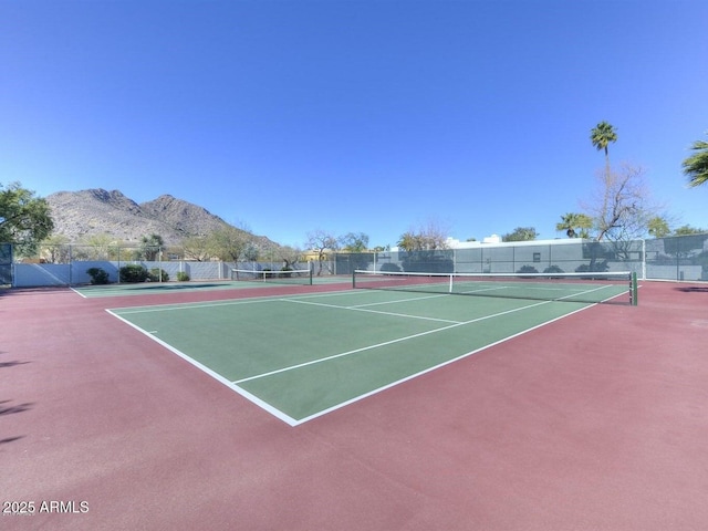 view of sport court with basketball court and a mountain view