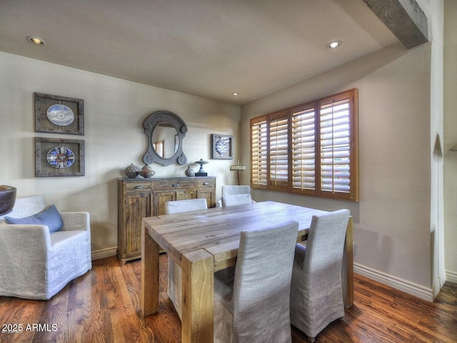 dining space with dark wood-type flooring