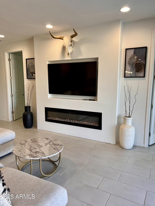 11074 W Tonto St, Avondale, AZ 85323 - living room with recessed lighting and a glass covered fireplace