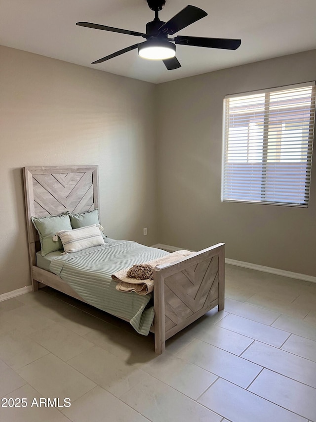11074 W Tonto St, Avondale, AZ 85323 - bedroom featuring a ceiling fan, baseboards, and light tile patterned floors