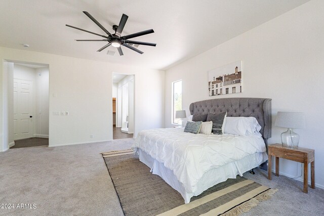 carpeted bedroom featuring ceiling fan