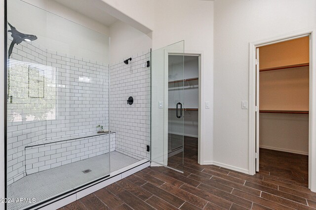 bathroom featuring an enclosed shower