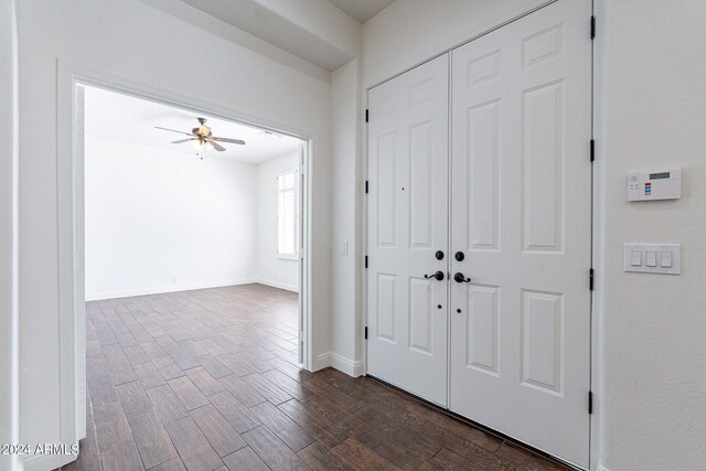 entrance foyer featuring ceiling fan and dark hardwood / wood-style floors