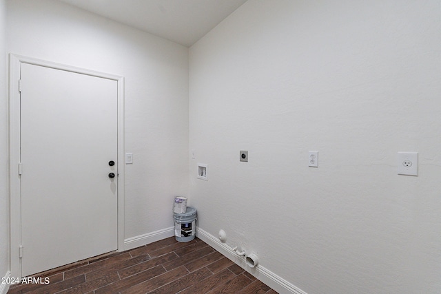 laundry area featuring dark hardwood / wood-style floors, hookup for a gas dryer, hookup for an electric dryer, and washer hookup