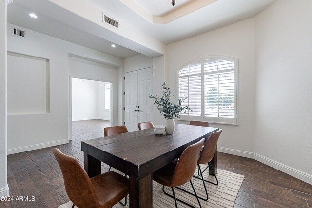 dining room featuring dark wood-type flooring