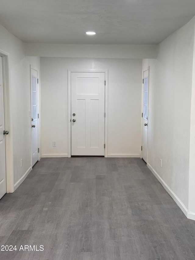 empty room featuring wood-type flooring