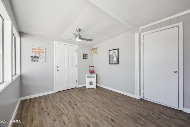 interior space featuring dark hardwood / wood-style floors and ceiling fan