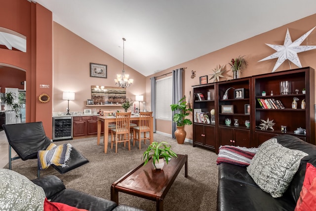 carpeted living room featuring high vaulted ceiling, beverage cooler, and an inviting chandelier