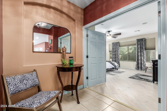 corridor featuring light hardwood / wood-style flooring