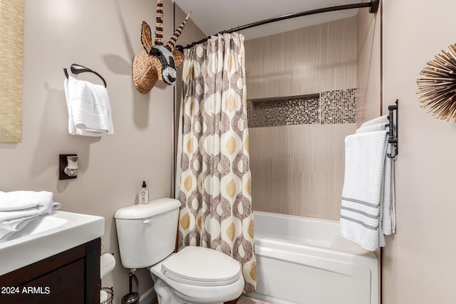 full bathroom featuring vanity, toilet, and shower / bath combination with curtain