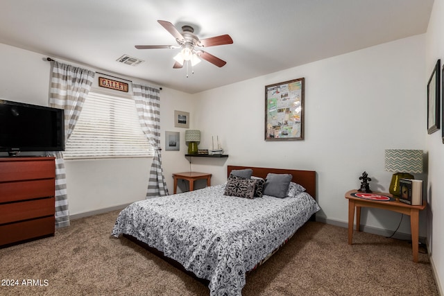 carpeted bedroom with ceiling fan