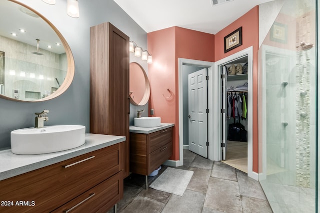 bathroom featuring vanity and a shower