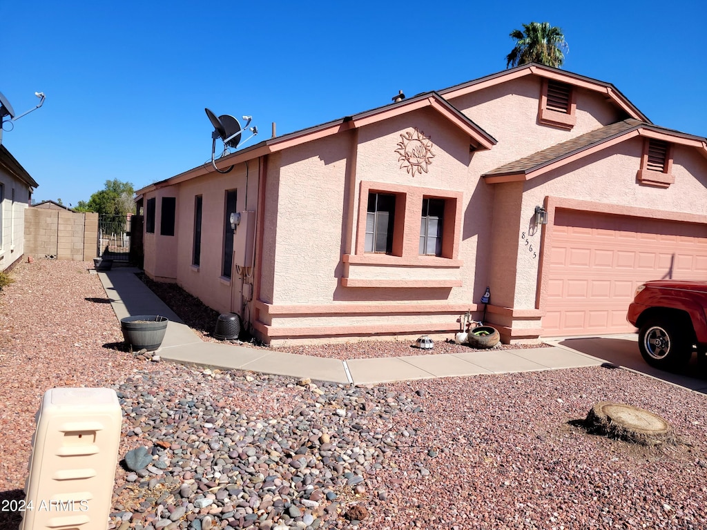 view of front of home featuring a garage