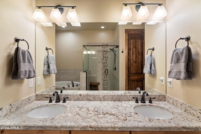 bathroom with vanity and plus walk in shower