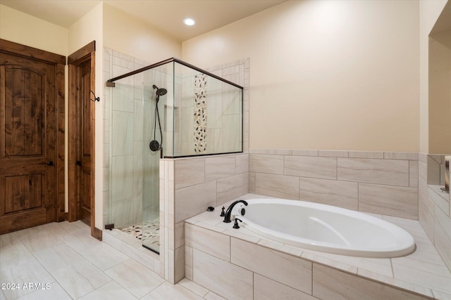 4320 W Arabian Trl, Flagstaff, AZ 86005 - bathroom with a garden tub and a shower stall