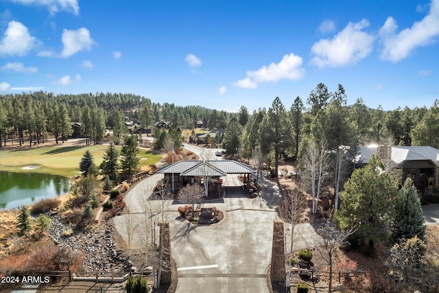 birds eye view of property featuring a water view