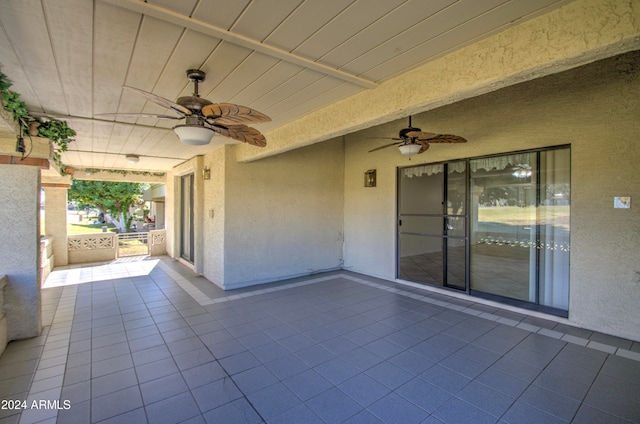 view of patio featuring ceiling fan