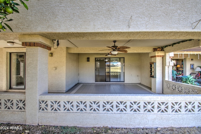 property entrance featuring ceiling fan