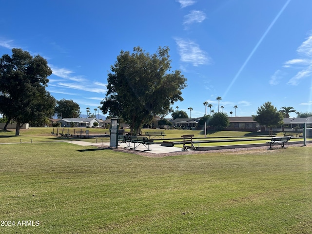 view of community featuring a yard