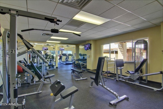 workout area with a drop ceiling