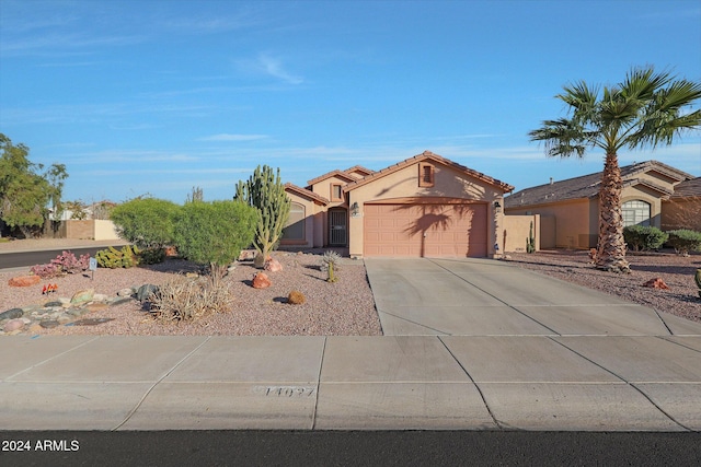 view of front of house with a garage