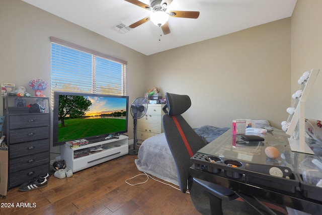 bedroom featuring dark hardwood / wood-style floors and ceiling fan