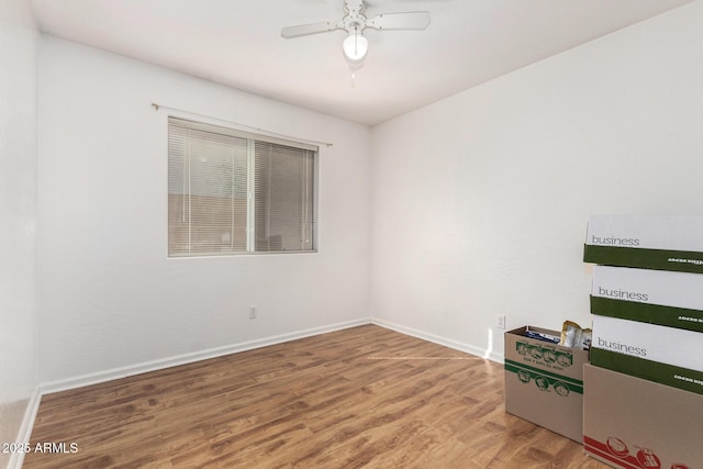 unfurnished room featuring hardwood / wood-style flooring and ceiling fan