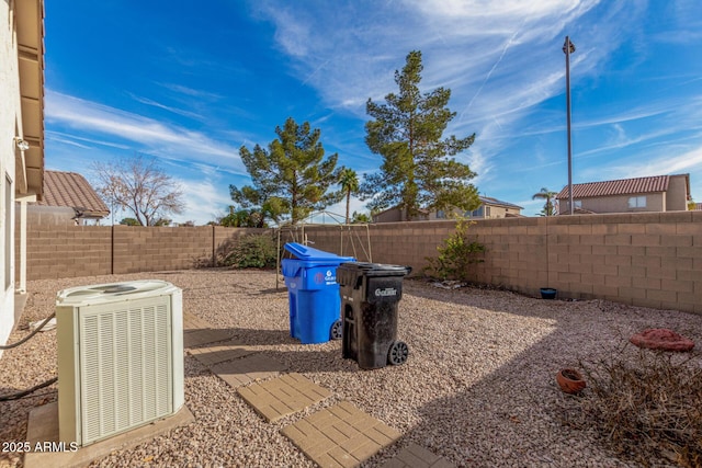 view of yard with central AC unit