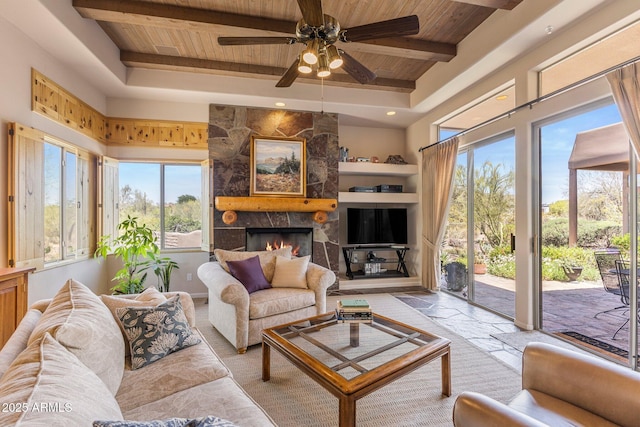 23760 N 80th Way, Scottsdale, AZ 85255 - living room with wood ceiling, a ceiling fan, a fireplace, beam ceiling, and recessed lighting