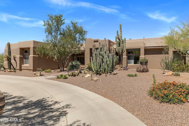 23760 N 80th Way, Scottsdale, AZ 85255 - pueblo-style house featuring stucco siding