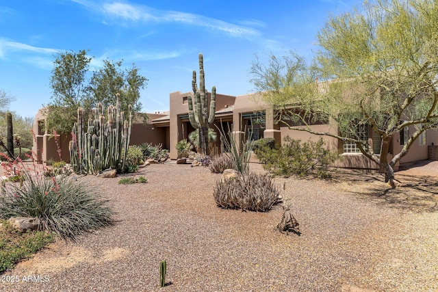 23760 N 80th Way, Scottsdale, AZ 85255 - pueblo-style house with stucco siding