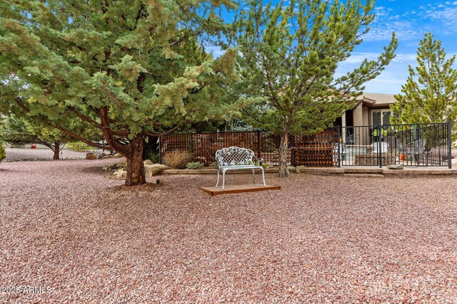 view of yard featuring fence