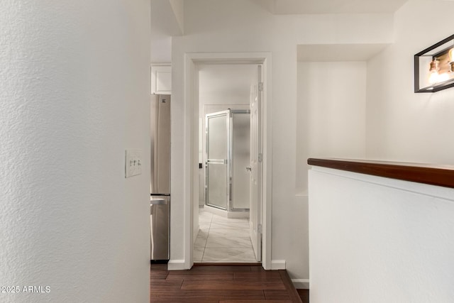 3633 N 3rd Ave Unit 2031, Phoenix, AZ 85013 - hall with dark wood-style floors and baseboards