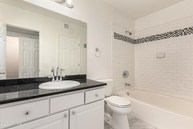 3633 N 3rd Ave Unit 2031, Phoenix, AZ 85013 - bathroom with vanity, washtub / shower combination, and marble finish flooring